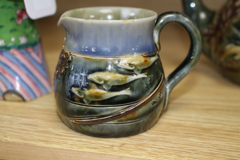 A Royal Doulton fish and pond weed three-piece tea set, designed by George Tinworth, made c.1905, teapot 13cm high